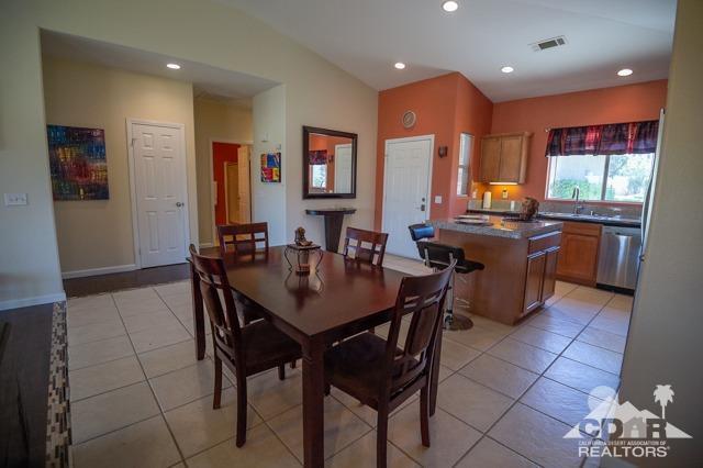 82320 Lancaster Way Indio, CA 92201 - Photo 7 of 27 a view of a dining room with furniture