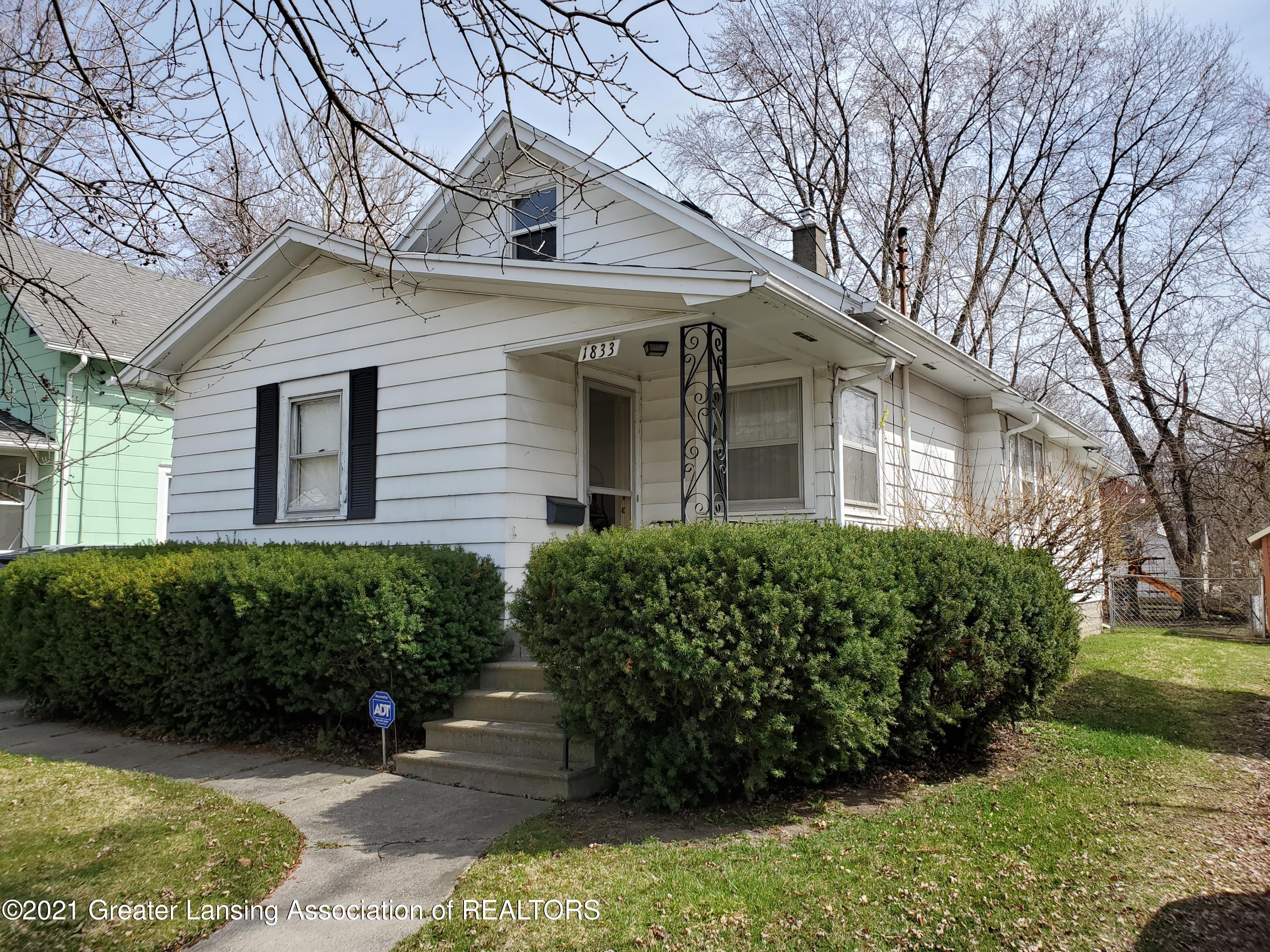 1833 South Rundle Avenue Lansing, MI 48910 - Photo 1 of 16 Front of House