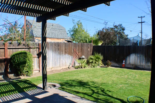 a view of garden with patio