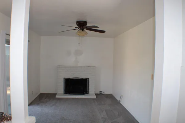 a view of a livingroom with a fireplace