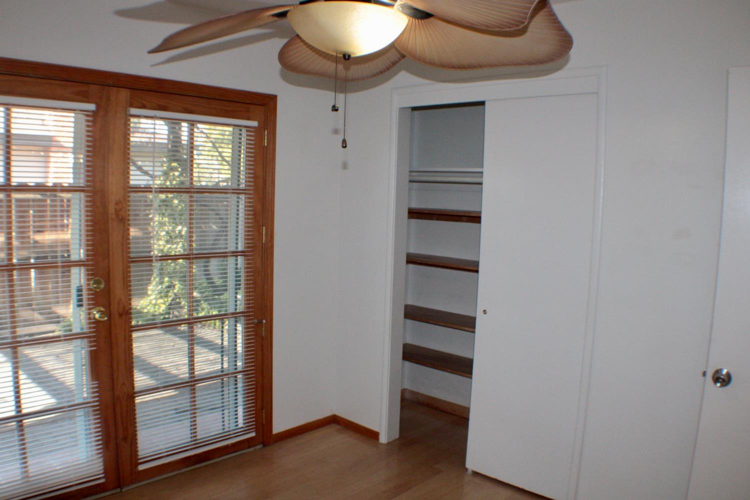 881 West Rialto Avenue Clovis, CA 93612 - Photo 7 of 25 wooden floor in an empty room with a window