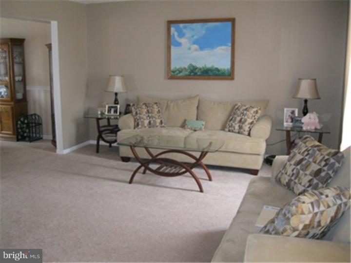 2902 Daniel Drive Sinking Spring, PA 19608 - Photo 2 of 24 a living room with furniture and a couch