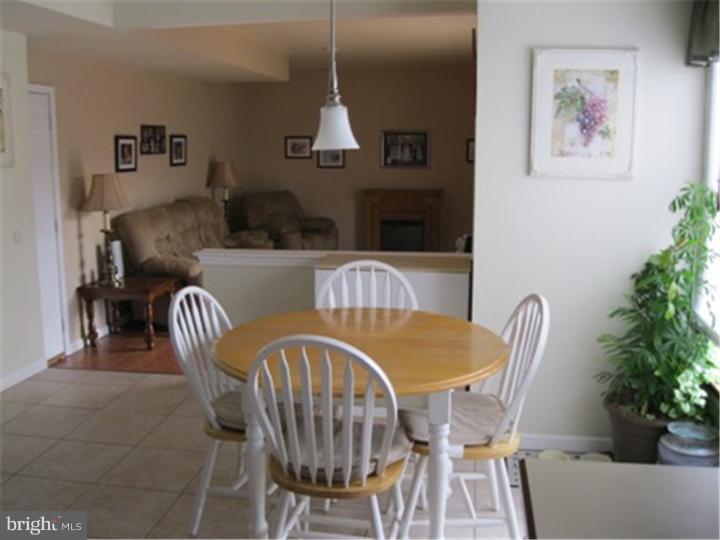 2902 Daniel Drive Sinking Spring, PA 19608 - Photo 11 of 24 a view of a dining room with furniture and wooden floor