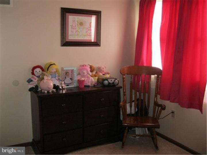 2902 Daniel Drive Sinking Spring, PA 19608 - Photo 18 of 24 a bed room with furniture and a window