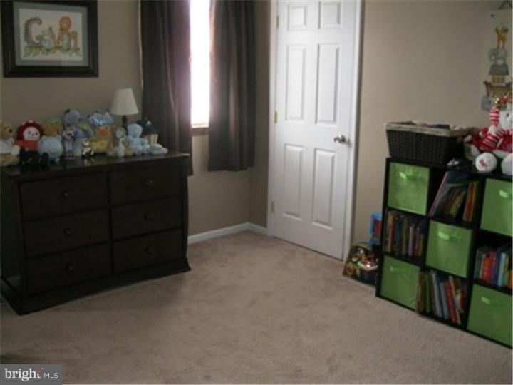 2902 Daniel Drive Sinking Spring, PA 19608 - Photo 20 of 24 a room with lots of books and a cabinet