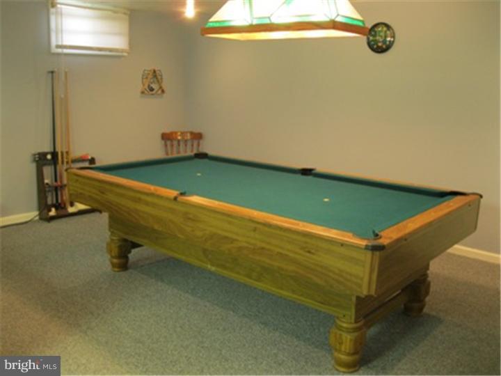 2902 Daniel Drive Sinking Spring, PA 19608 - Photo 21 of 24 a room with pool table and a chandelier