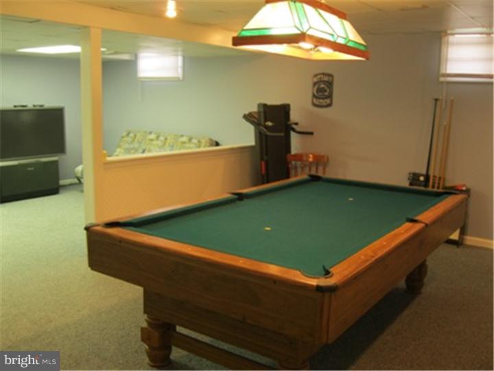 2902 Daniel Drive Sinking Spring, PA 19608 - Photo 22 of 24 a room with pool table and a chandelier
