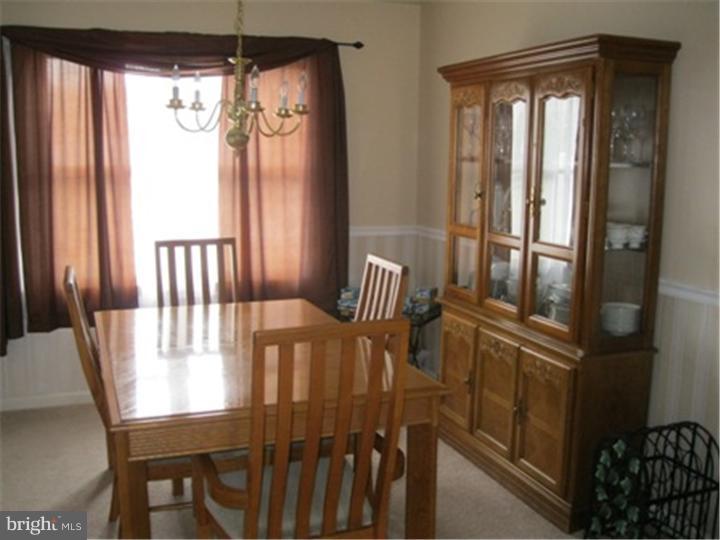 2902 Daniel Drive Sinking Spring, PA 19608 - Photo 7 of 24 a view of a dining room with furniture window and outside view