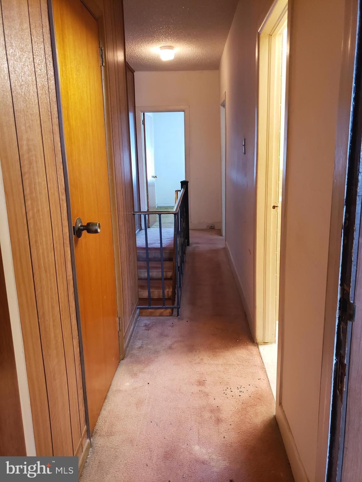 2436 West Ritner Street Philadelphia, PA 19145 - Photo 29 of 64 2nd Fl Hallway w/closet & wood floors under carpet