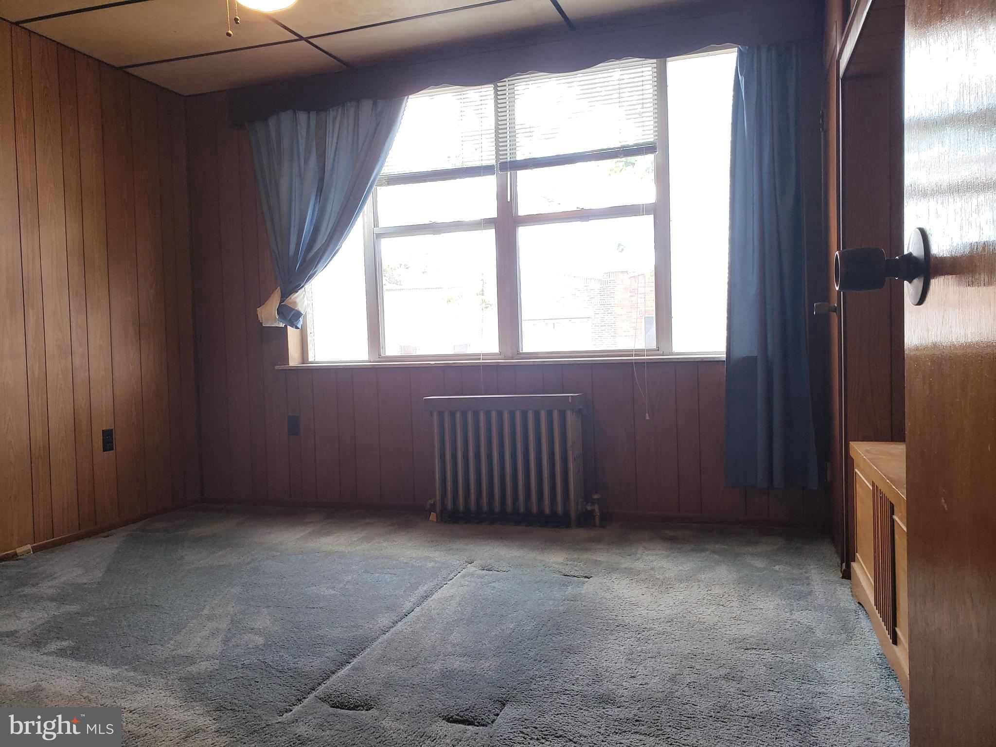 2436 West Ritner Street Philadelphia, PA 19145 - Photo 33 of 64 Front Bedroom (original wood floor under carpet)