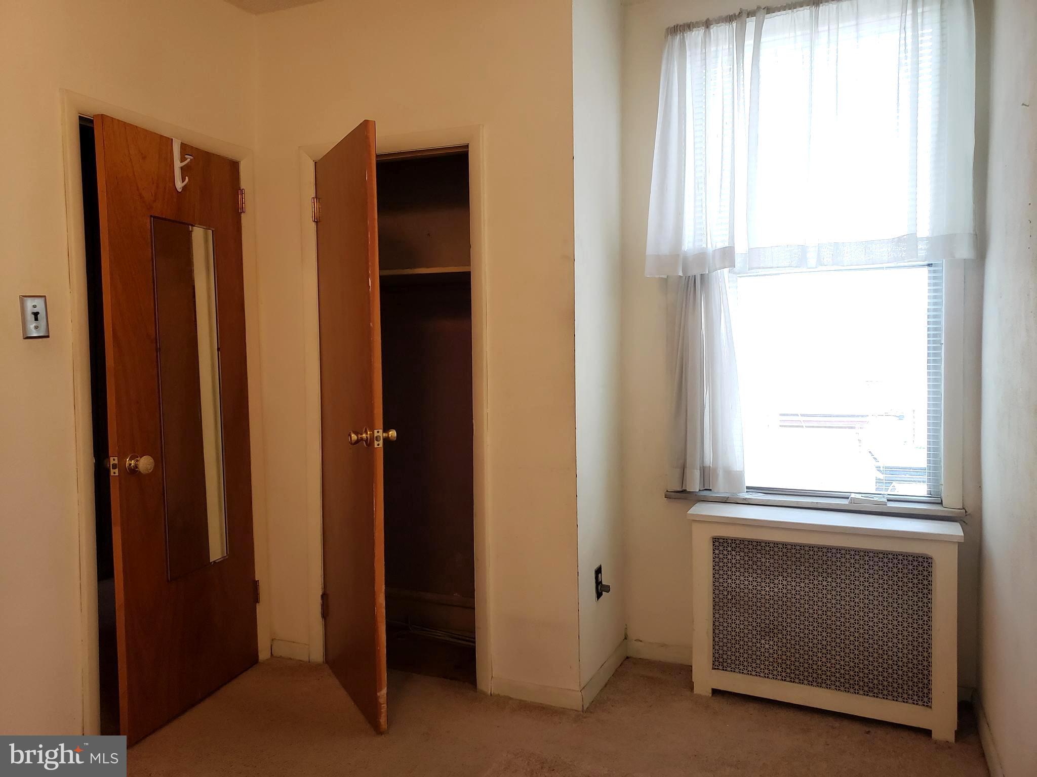 2436 West Ritner Street Philadelphia, PA 19145 - Photo 40 of 64 Middle Bedroom (original wood floor under carpet)
