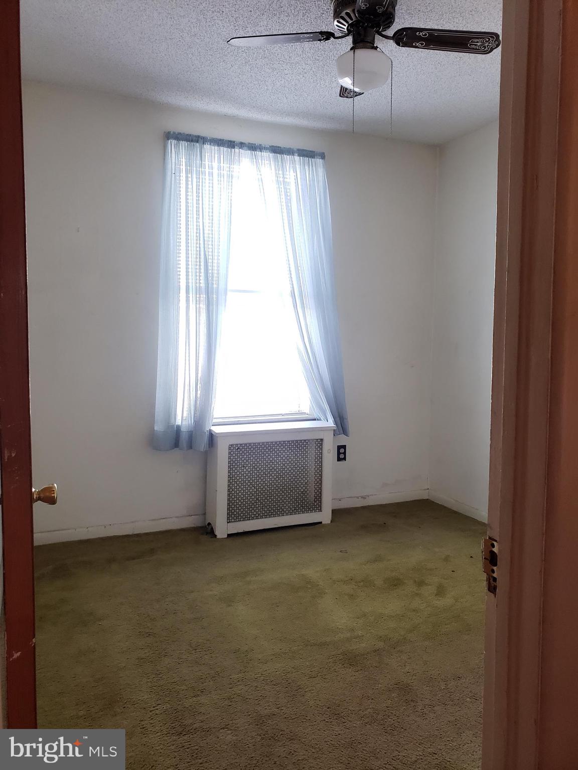 2436 West Ritner Street Philadelphia, PA 19145 - Photo 44 of 64 Rear Bedroom (original wood floor under carpet)