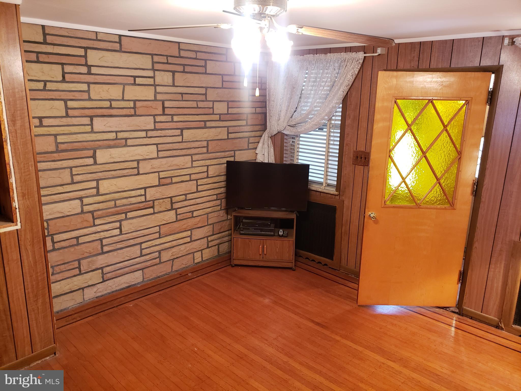2436 West Ritner Street Philadelphia, PA 19145 - Photo 10 of 64 Living area original hardwood floors