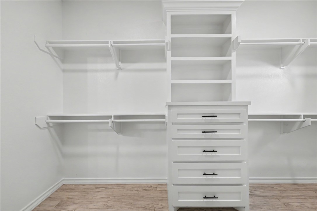 143 Amethyst Street Portland, TX 78374 - Photo 15 of 26 a view of an empty walk in closet