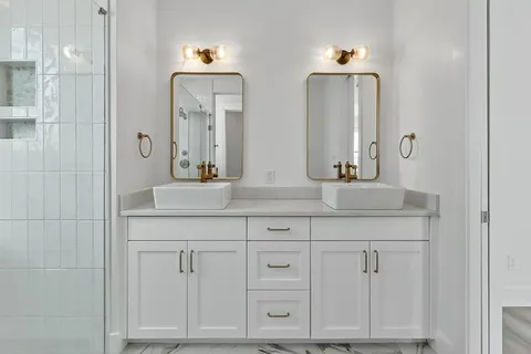 a bathroom with a sink and a vanity
