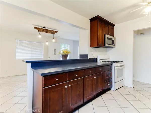 a view of cabinets and window