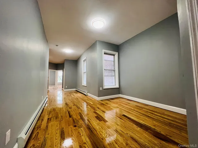a view of an empty room and window