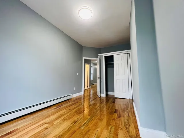 a kitchen with stainless steel appliances granite countertop a stove a refrigerator and a cabinets