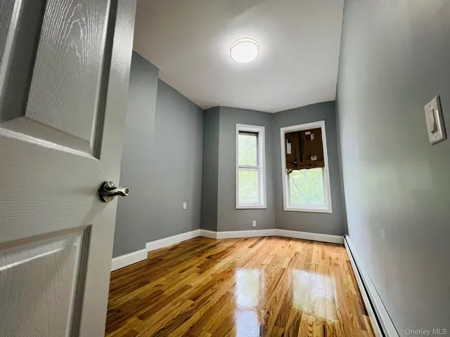 a view of walk in closet with window