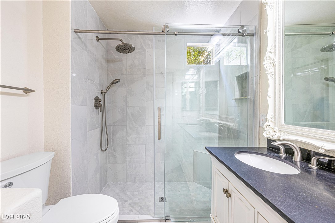 10133 Rice Paper Street Las Vegas, NV 89183 - Photo 23 of 36 Full bathroom featuring vanity. NEW Custom Shower over $10k !