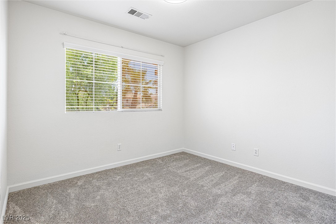 10133 Rice Paper Street Las Vegas, NV 89183 - Photo 25 of 36 Unfurnished room with NEW carpet floors