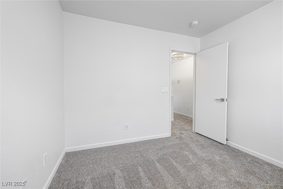 10133 Rice Paper Street Las Vegas, NV 89183 - Photo 28 of 36 Walk In Closet. NEW Carpet, Blinds, Lighting, Outlets, Door Handles