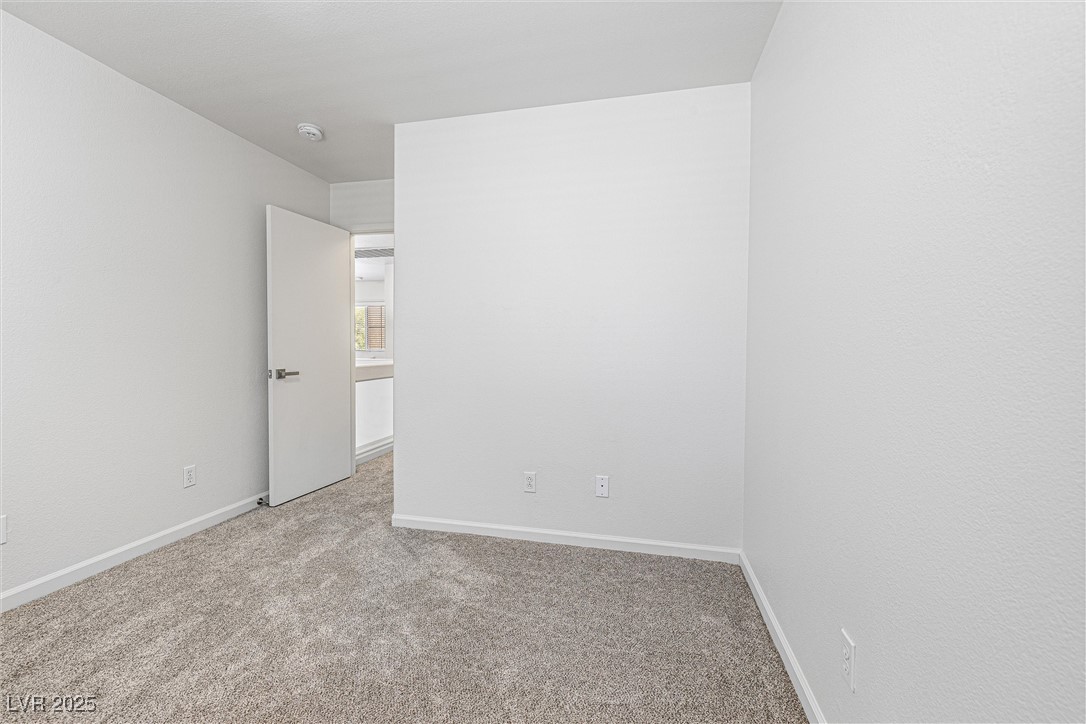 10133 Rice Paper Street Las Vegas, NV 89183 - Photo 30 of 36 Walk In Closet, NEW Carpet, Blinds, Lighting, Outlets, Door Handles
