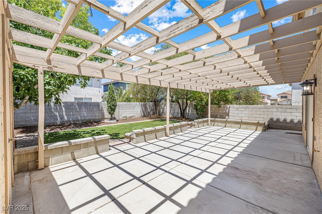10133 Rice Paper Street Las Vegas, NV 89183 - Photo 32 of 36 Stunning Backyard, pergola, NEW Luxury Turf, Mature Trees, SHED