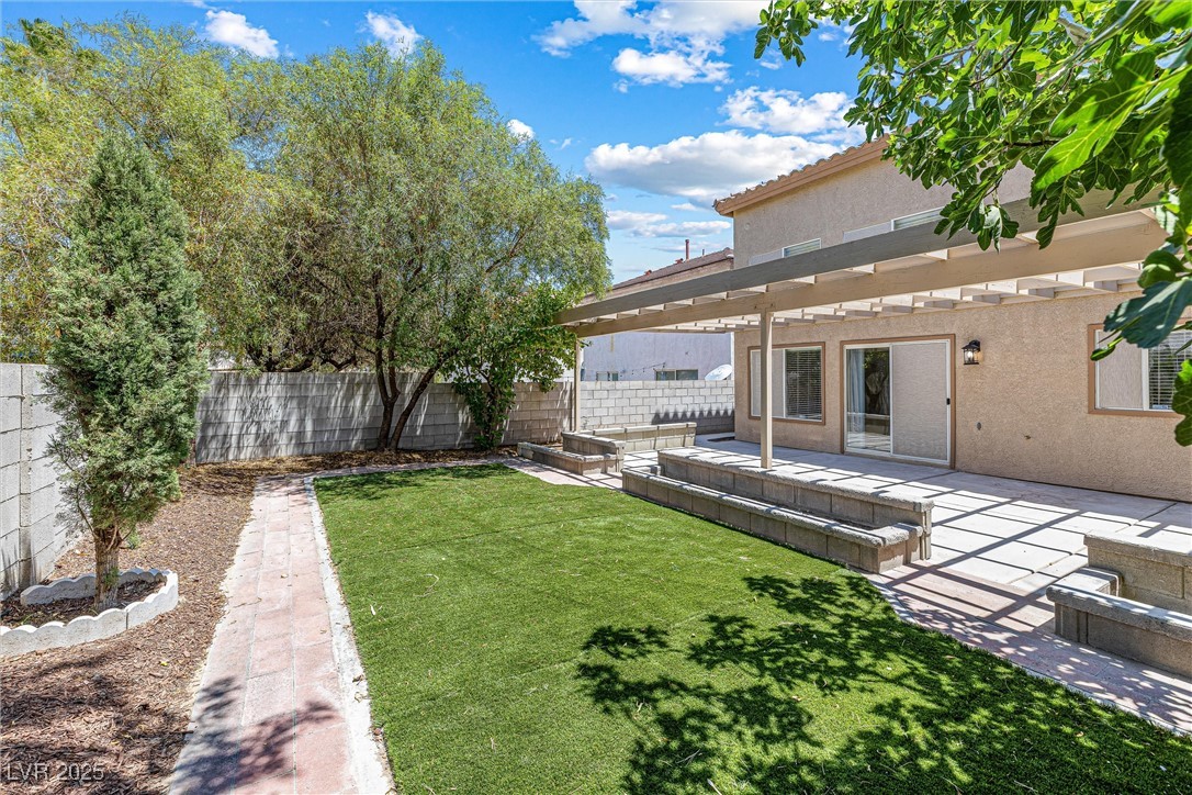 10133 Rice Paper Street Las Vegas, NV 89183 - Photo 35 of 36 Gorgeous Upgraded Low Maintenance Yard with Mature trees+ Fruit Treesa