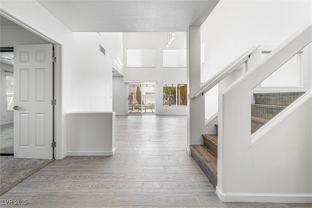 10133 Rice Paper Street Las Vegas, NV 89183 - Photo 9 of 36 Gorgeous Entry with New LED lighting throughout