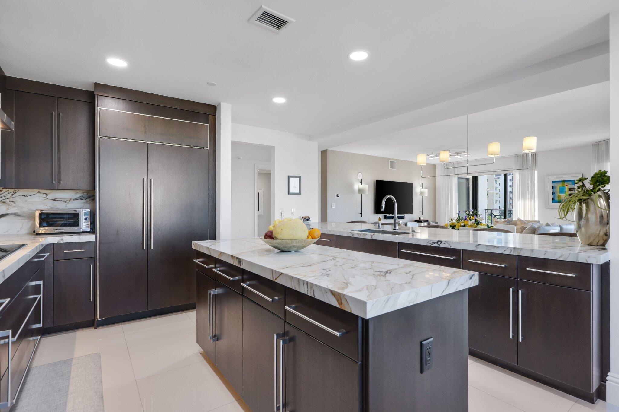 200 East Palmetto Park Road, Unit 505 Boca Raton, FL 33432 - Photo 15 of 71 a kitchen with a sink and refrigerator