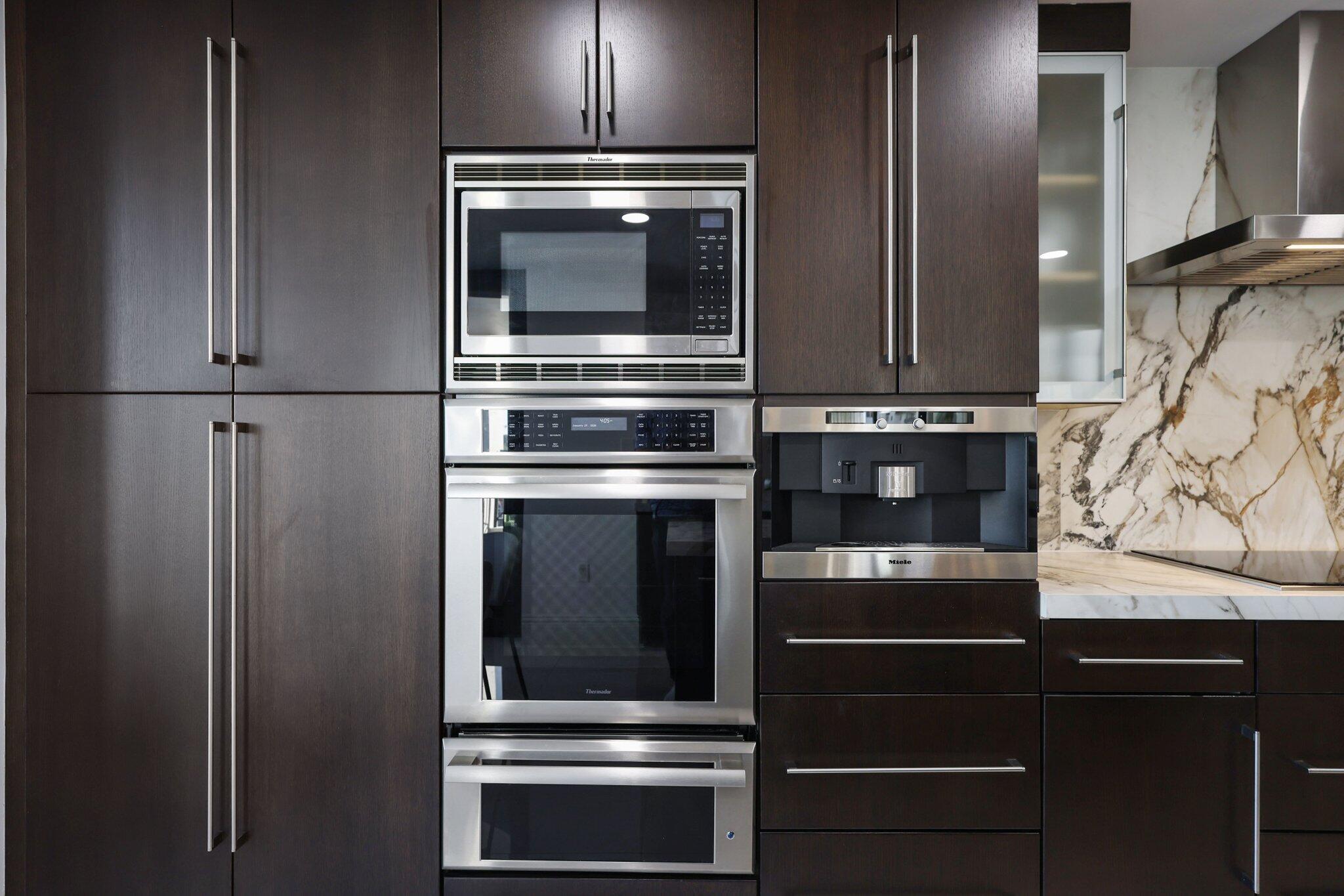 200 East Palmetto Park Road, Unit 505 Boca Raton, FL 33432 - Photo 18 of 71 a kitchen with appliances and cabinets