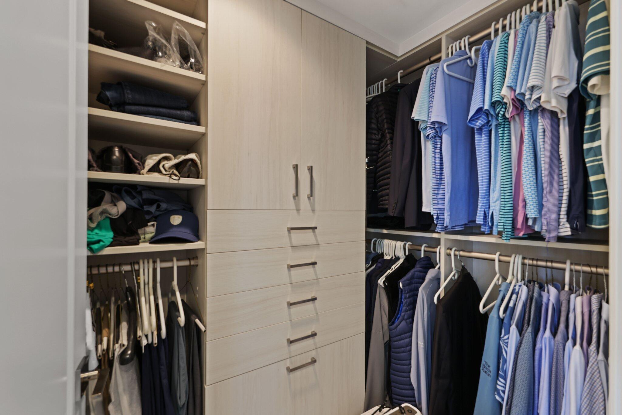 200 East Palmetto Park Road, Unit 505 Boca Raton, FL 33432 - Photo 27 of 71 a view of walk in closet with clothes and shoes