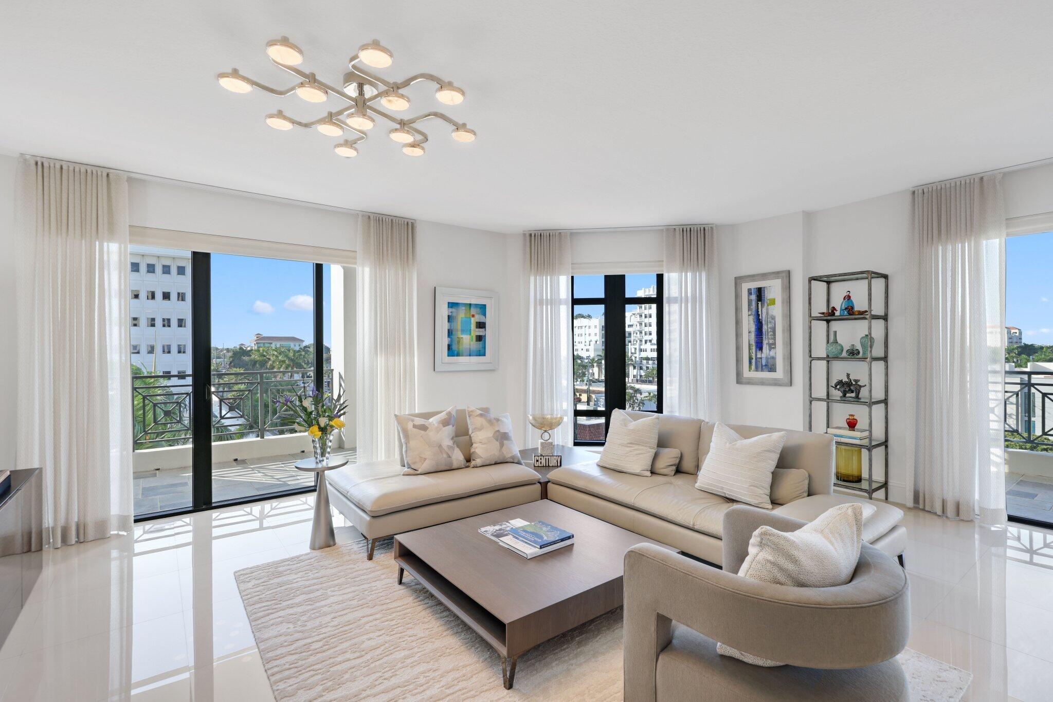 200 East Palmetto Park Road, Unit 505 Boca Raton, FL 33432 - Photo 5 of 71 a living room with furniture and a large window