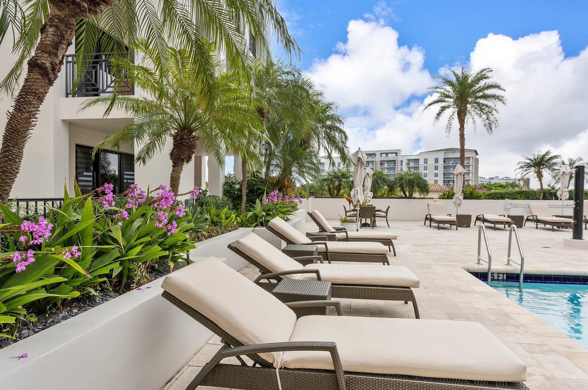 200 East Palmetto Park Road, Unit 505 Boca Raton, FL 33432 - Photo 57 of 71 a view of a patio with couches and a potted plant on the table and chairs