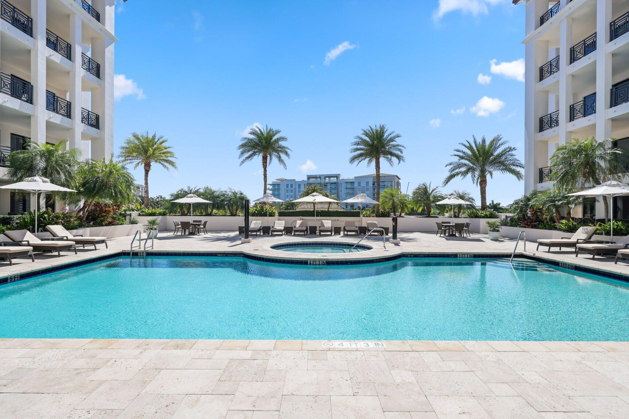 200 East Palmetto Park Road, Unit 505 Boca Raton, FL 33432 - Photo 58 of 71 a view of swimming pool with outdoor seating and plants