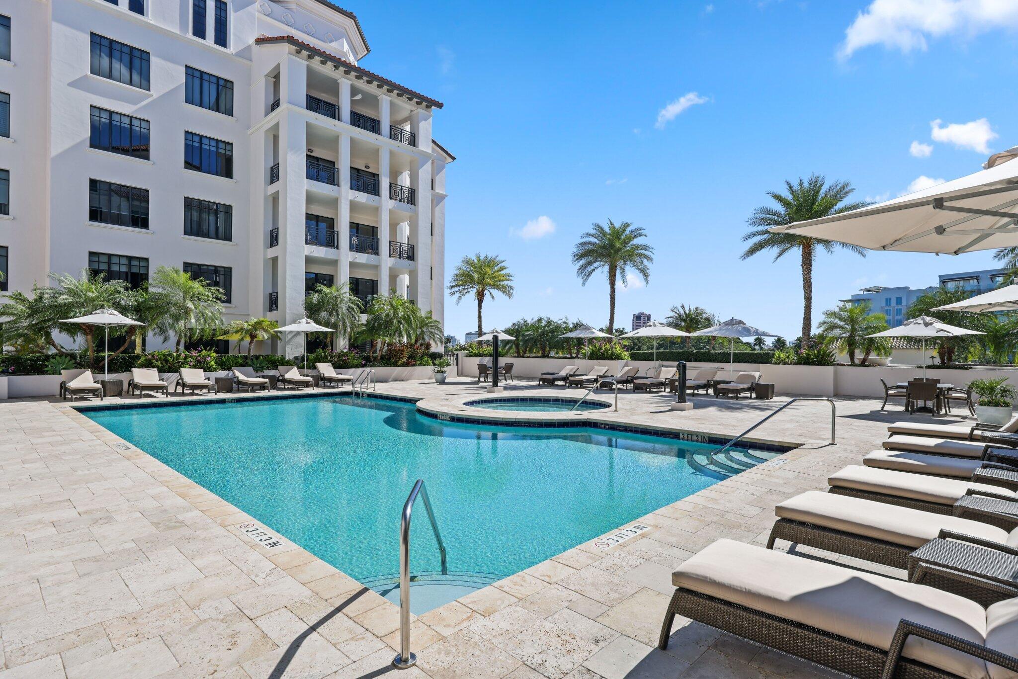 200 East Palmetto Park Road, Unit 505 Boca Raton, FL 33432 - Photo 59 of 71 a view of a swimming pool with outdoor seating