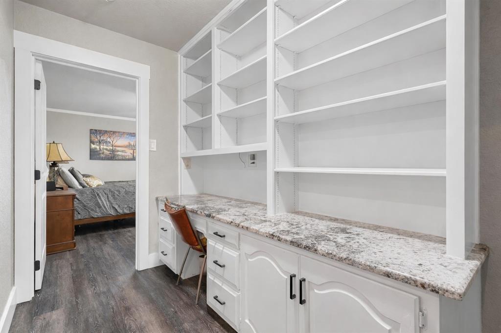 11541 Old Dallas Road West, TX 76691 - Photo 10 of 39 a kitchen with a sink and a refrigerator