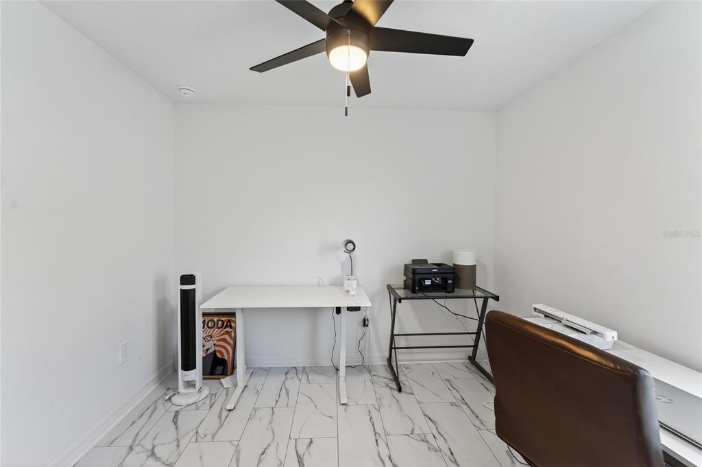 13073 Garnet Raspberry Avenue Wimauma, FL 33598 - Photo 17 of 50 a kitchen with a sink and cabinets