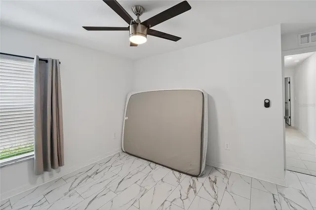 a view of a hallway with a workspace