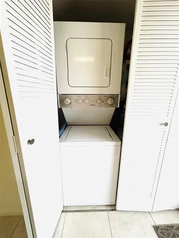 a utility room with a washer and dryer