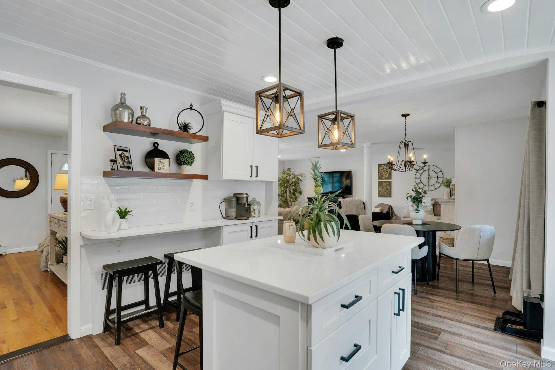 12 Rachel Avenue Commack, NY 11725 - Photo 24 of 50 a view of dining room and kitchen with a table chairs