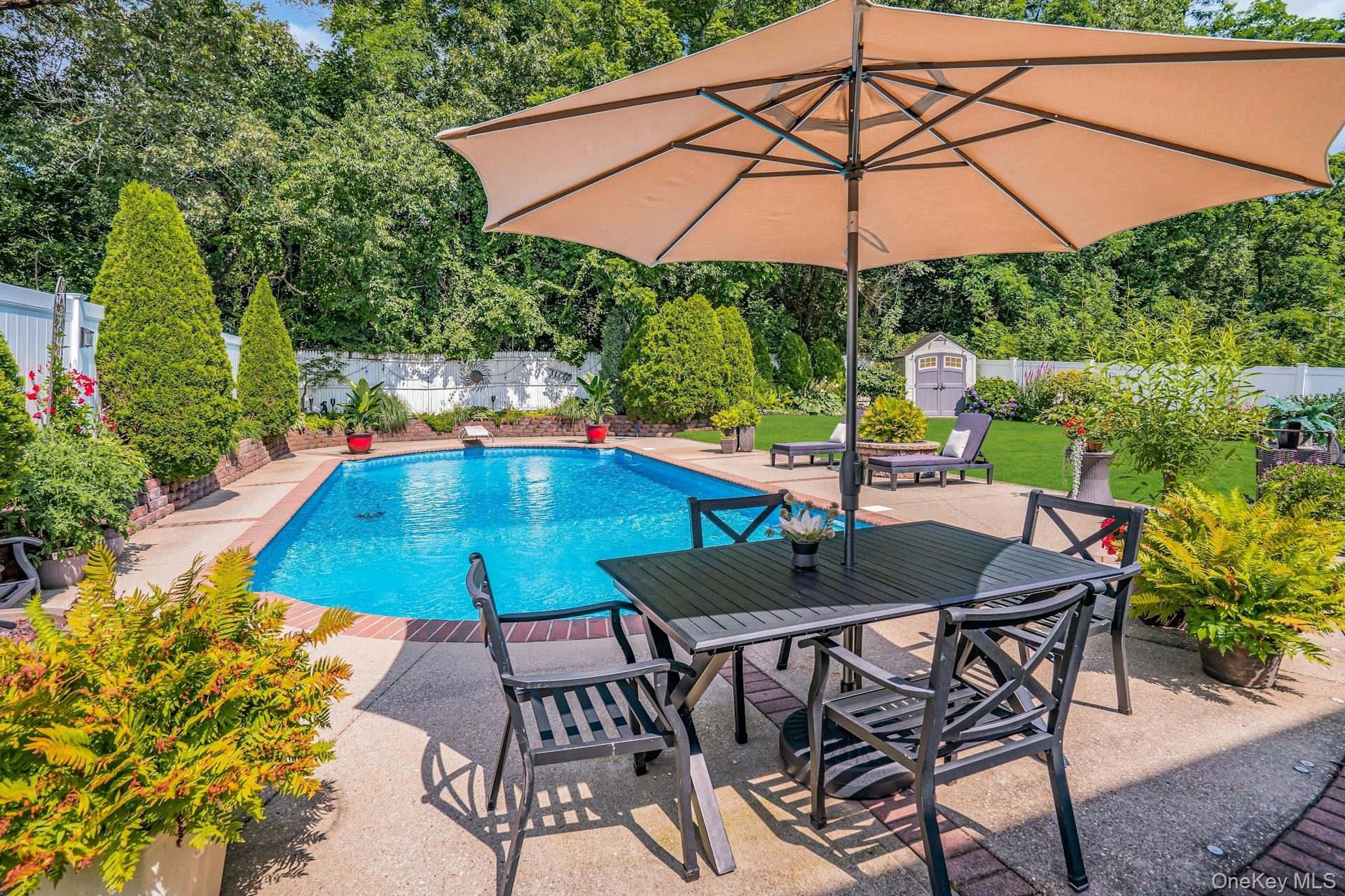 12 Rachel Avenue Commack, NY 11725 - Photo 36 of 50 a view of an outdoor sitting area with furniture and backyard