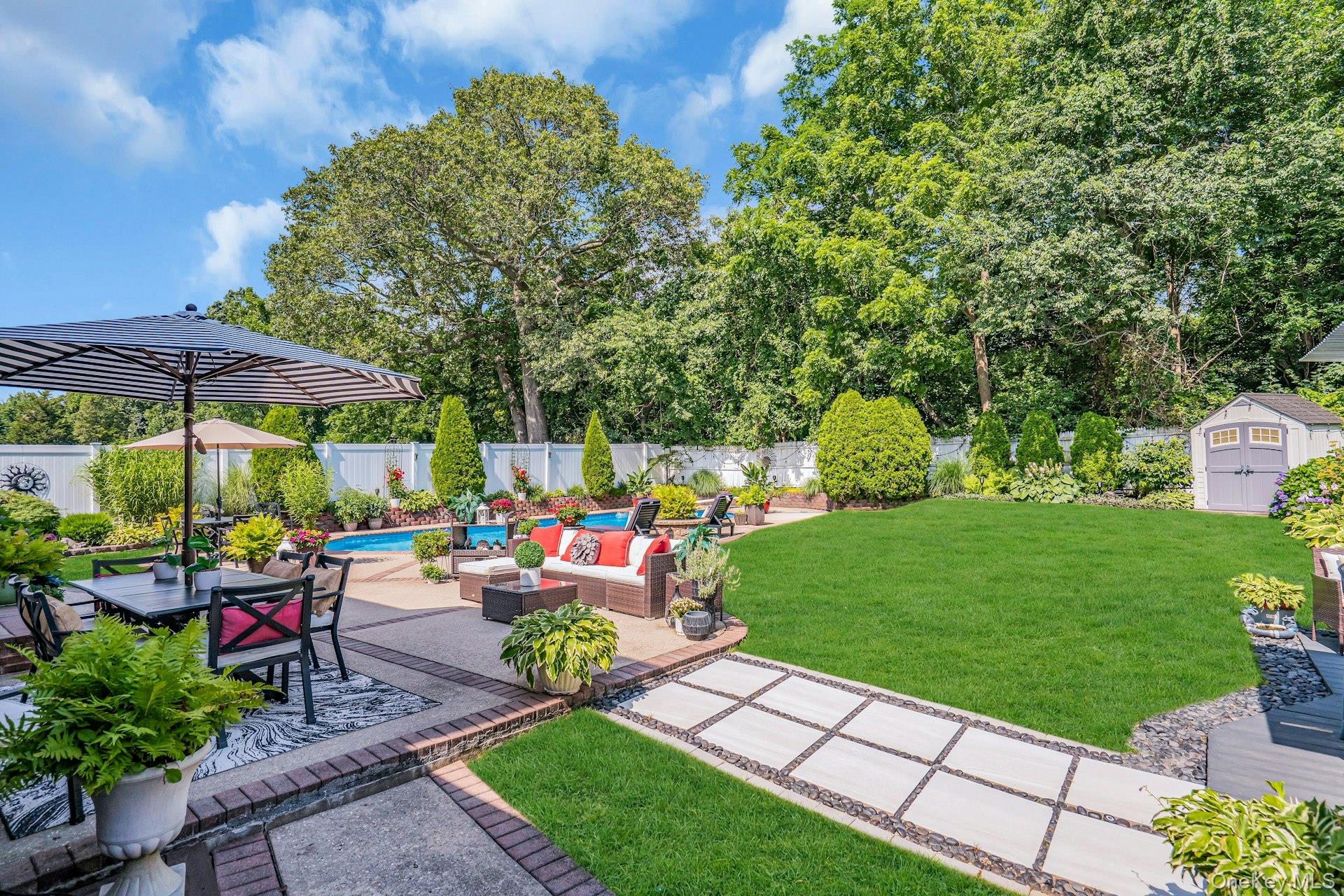 12 Rachel Avenue Commack, NY 11725 - Photo 48 of 50 a garden view with a seating space