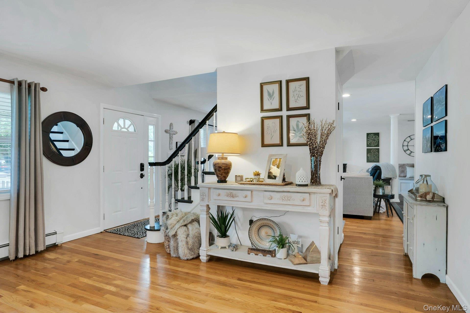 12 Rachel Avenue Commack, NY 11725 - Photo 7 of 50 a living room with furniture and a wooden floor