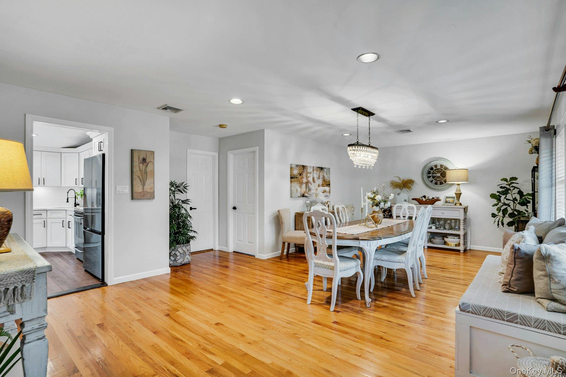 12 Rachel Avenue Commack, NY 11725 - Photo 8 of 50 a dining room with furniture and wooden floor