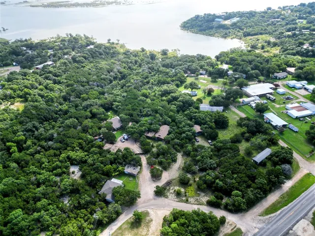 a view of a lake with green space