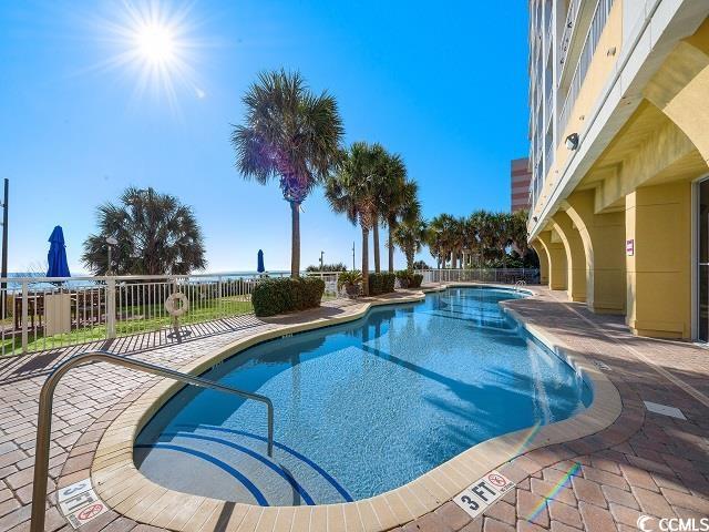 2000 North Ocean Boulevard, Unit 1612 Myrtle Beach, SC 29577 - Photo 13 of 21 View of swimming pool with a patio area