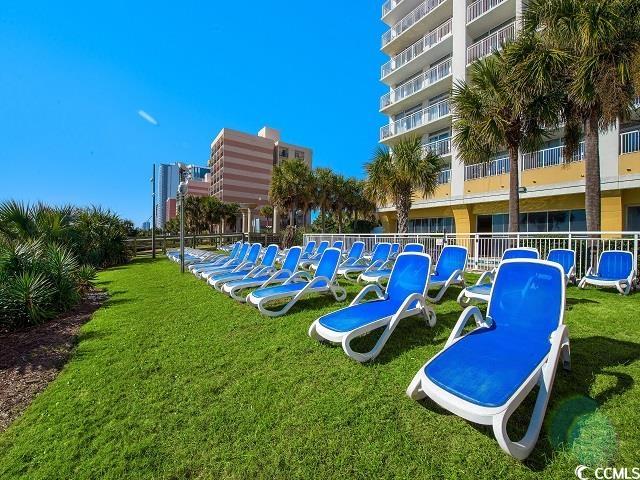 2000 North Ocean Boulevard, Unit 1612 Myrtle Beach, SC 29577 - Photo 14 of 21 View of community featuring a yard