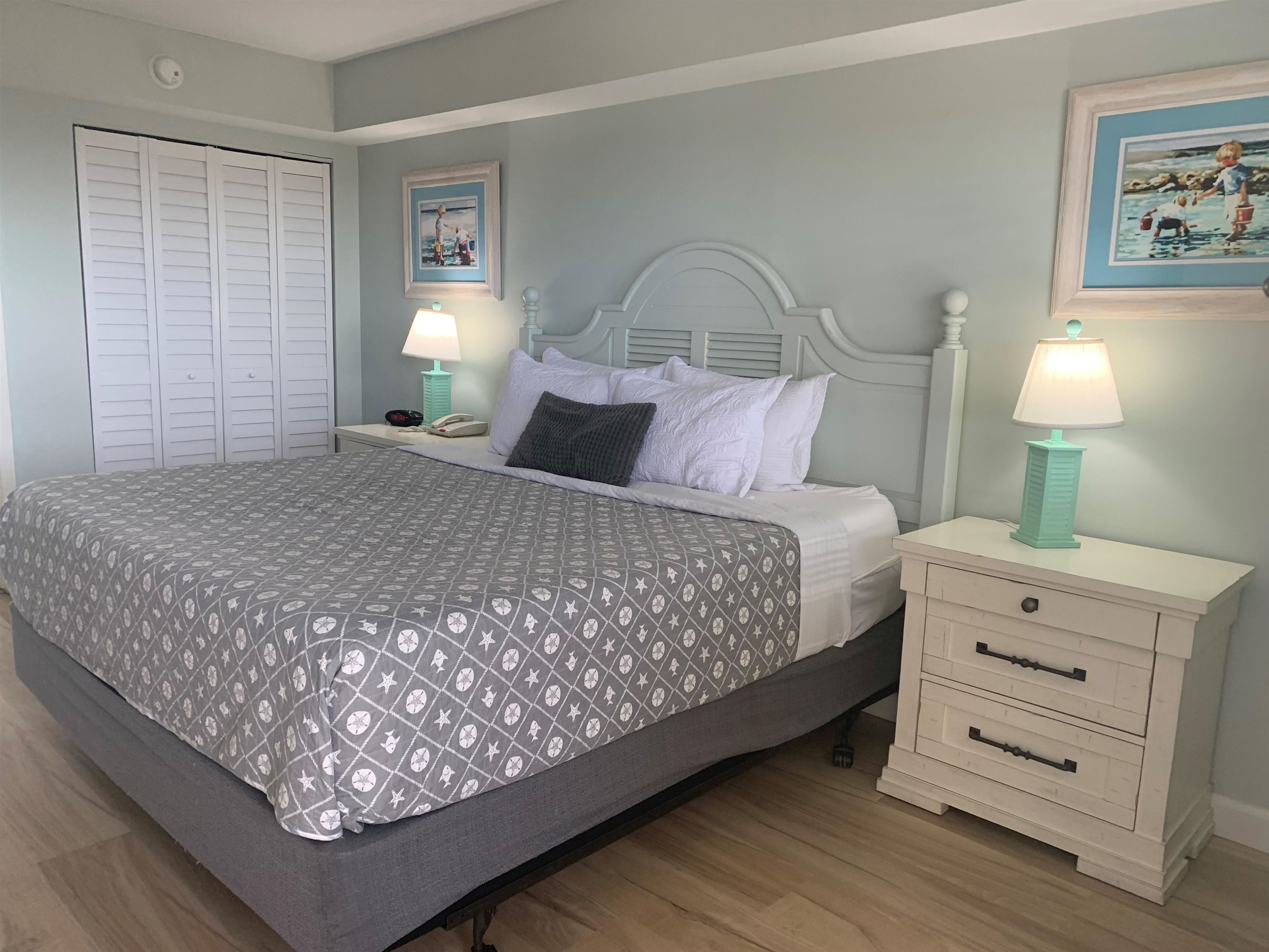 2000 North Ocean Boulevard, Unit 1612 Myrtle Beach, SC 29577 - Photo 15 of 21 Bedroom featuring a closet and light wood-style flooring